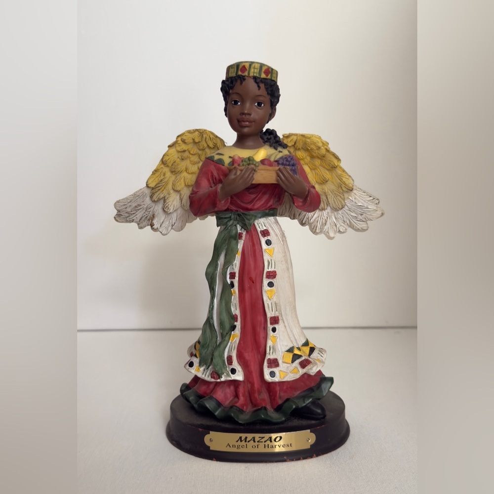 Colorful Angel Figurine with Gold Wings